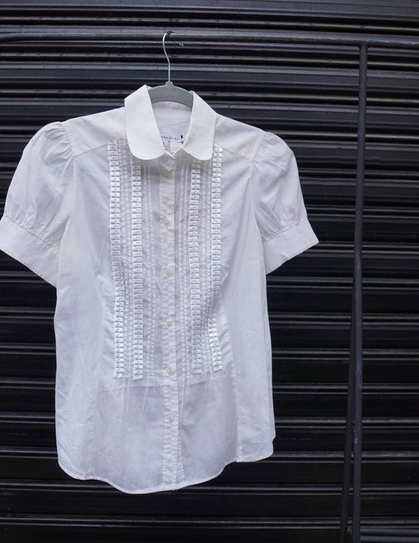 Blusa blanca manga corta de Zara